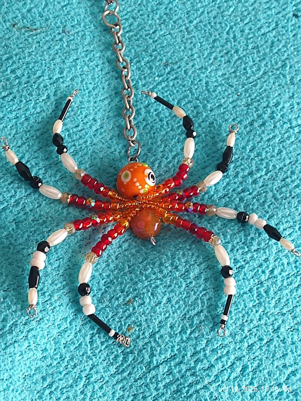 Handmade Orange, Red, White & Black Beaded Spider Pendant